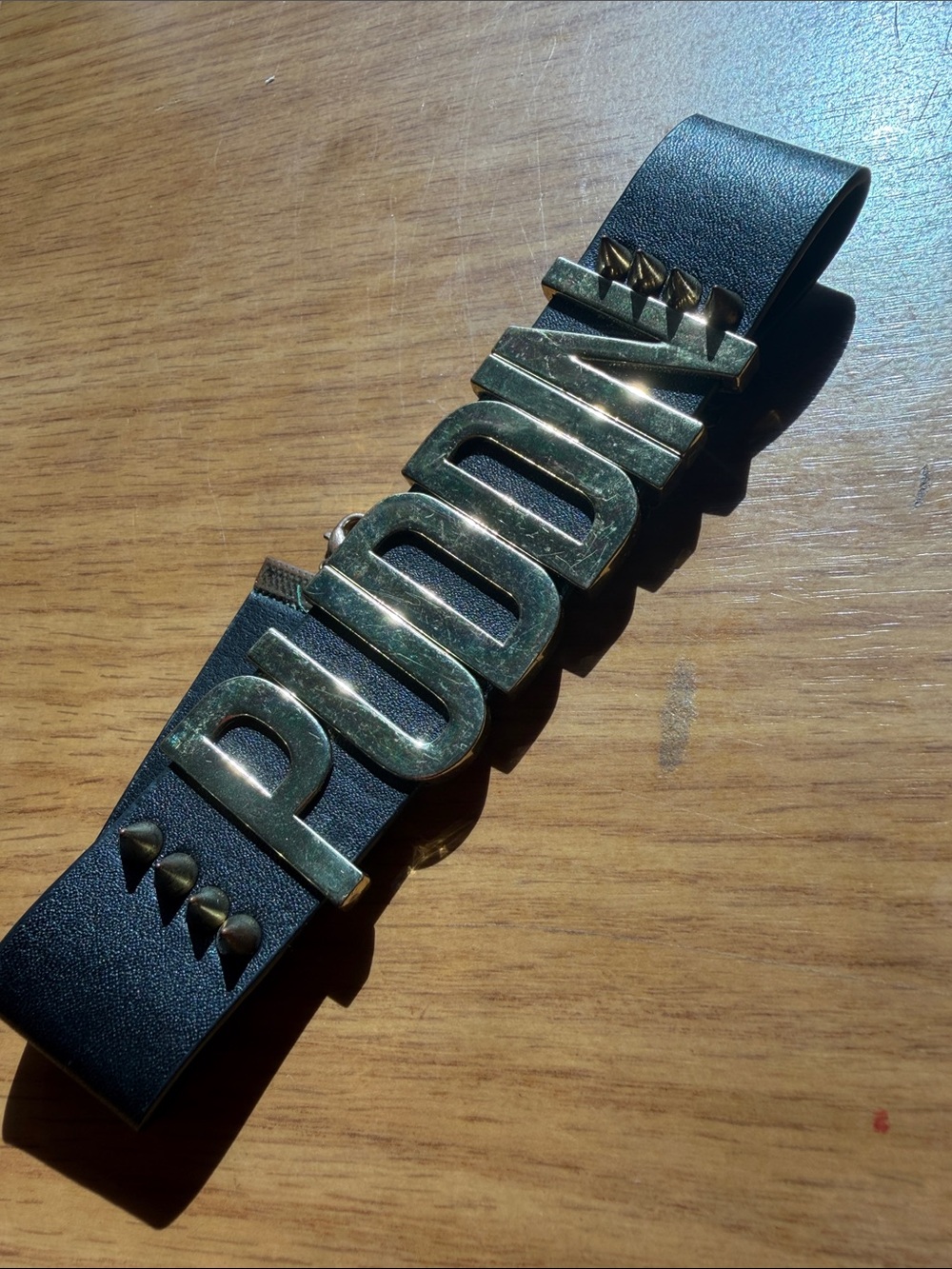 PUDNIK Black Leather Bracelet with Gold Lettering